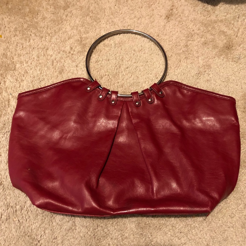 Red leather bag with silver metal ring handles